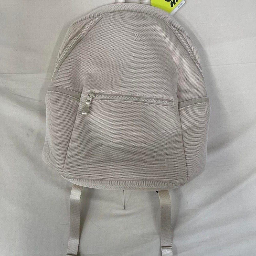 Beige backpack with gray accents